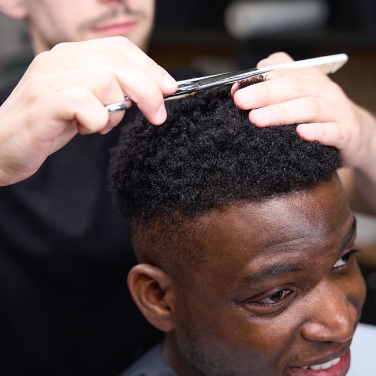 WEBman-getting-haircut-by-barber-in-hair-salon-2026-09-23-19-26-19-utc